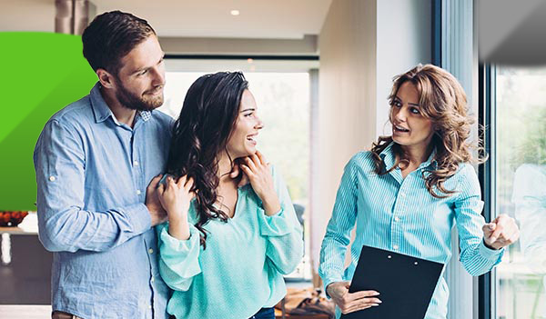 couple viewing a house with estate agent