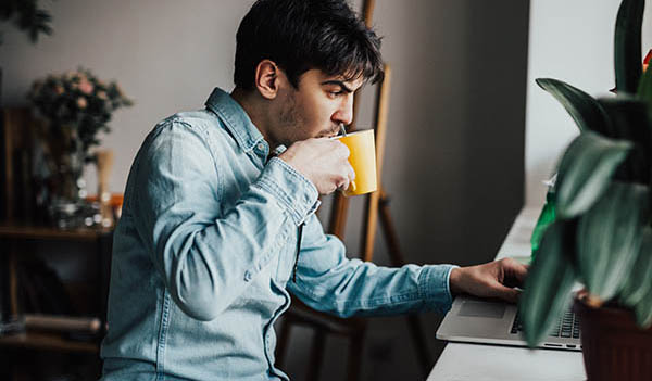 man drinking coffee