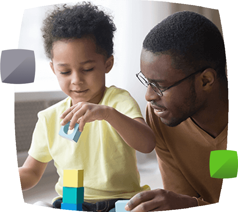 Man and son playing block building