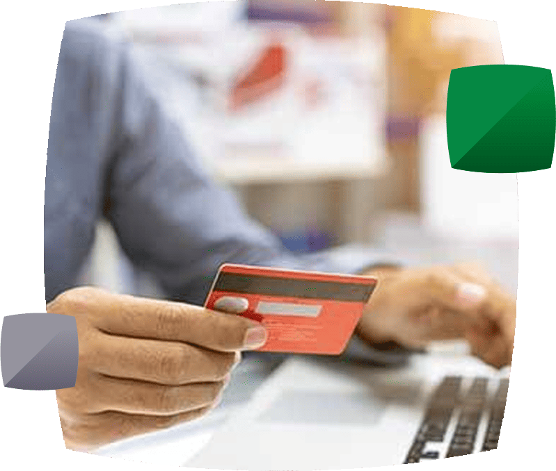 person looking at credit card