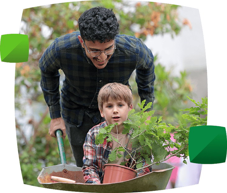 Father and son happy in the garden