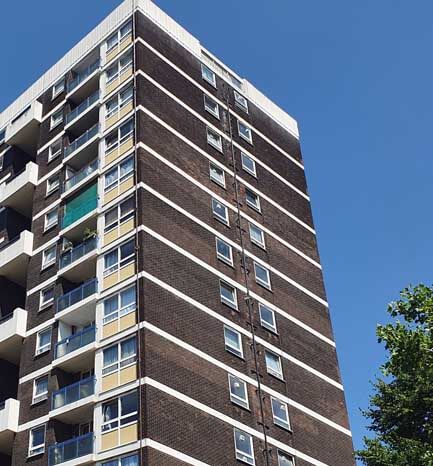 block of flats and blue sky