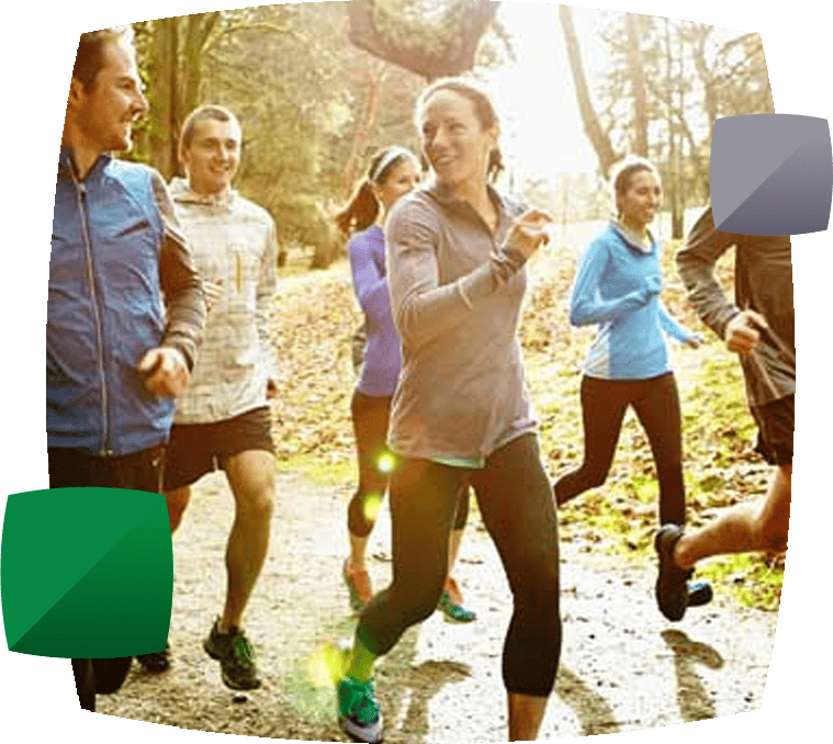 Friends running in woods