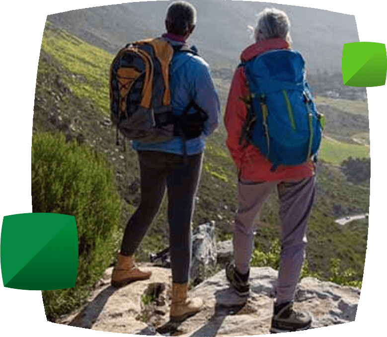 Backpacking couple standing on mountain