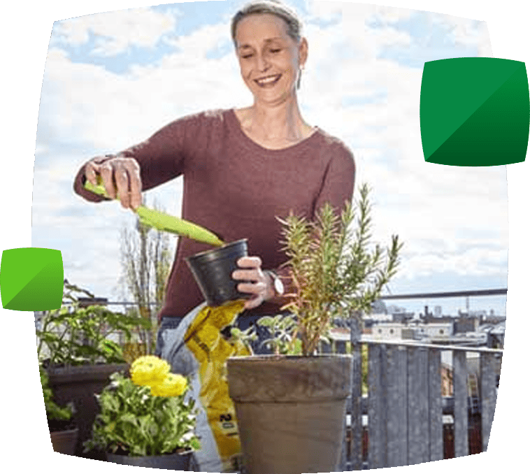 Person gardening on balcony