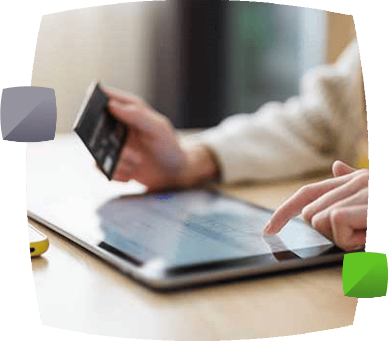 Person using credit card via tablet device