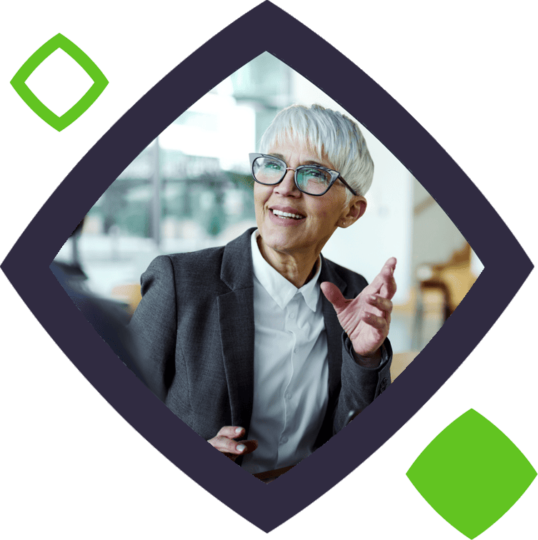Woman in suit wearing glasses