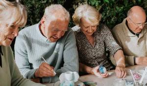 older adults doing crafts