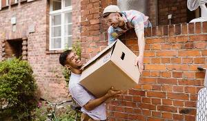 people passing a moving box